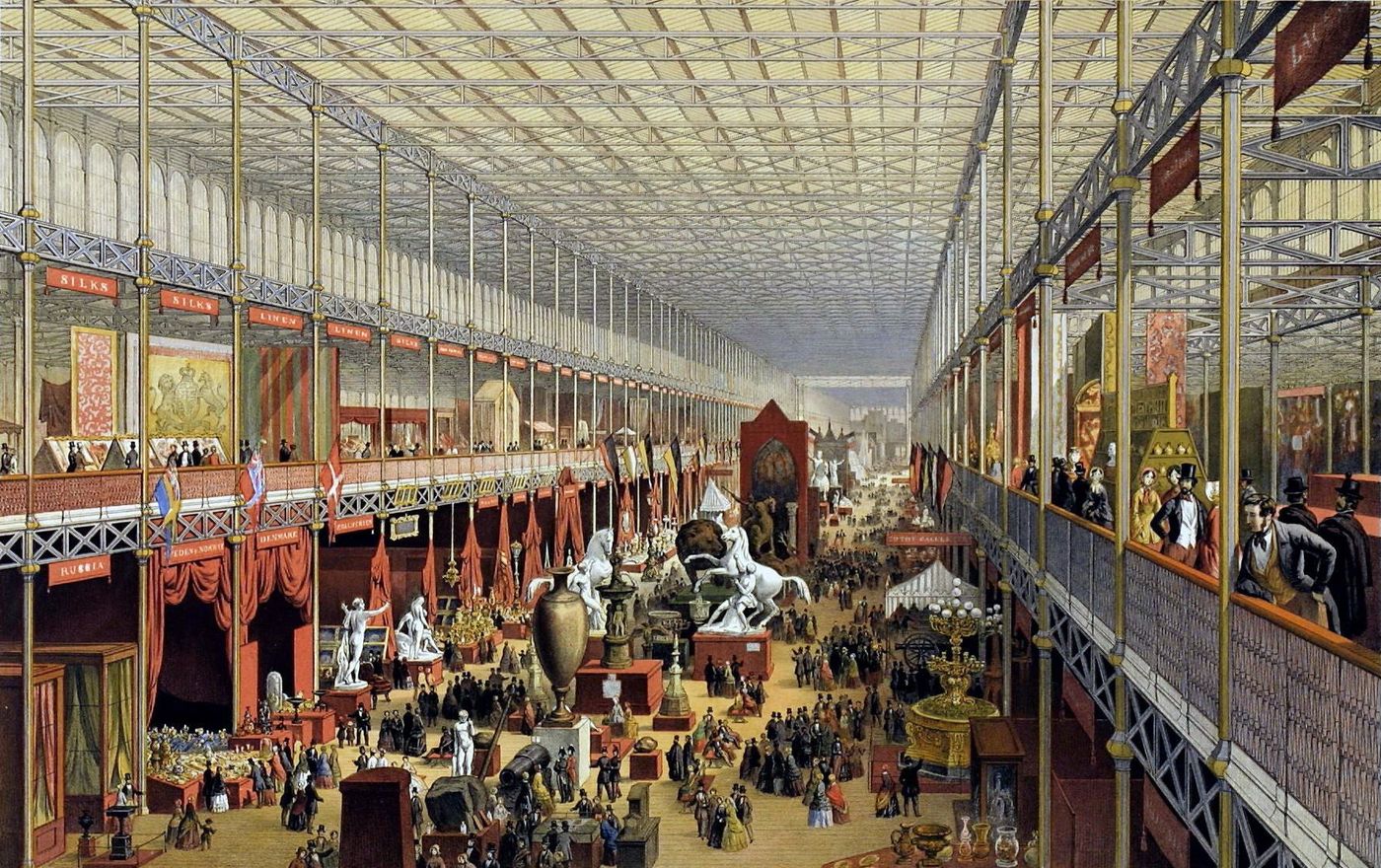 Interior of the Crystal Palace during the Great Exhibition of 1851, with trees and crowds under iron-and-glass